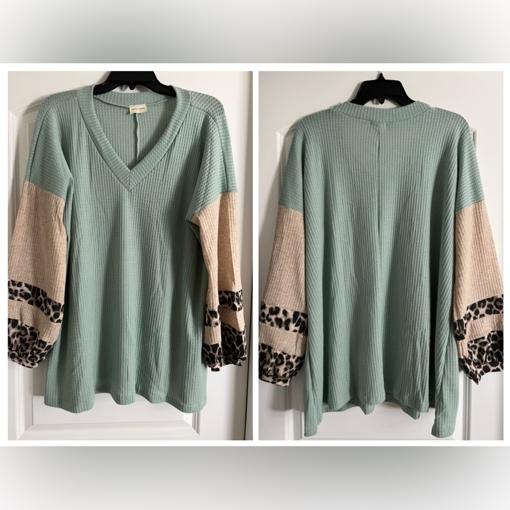 Pullover V-neck. Soft and flowy. Brand new never worn.